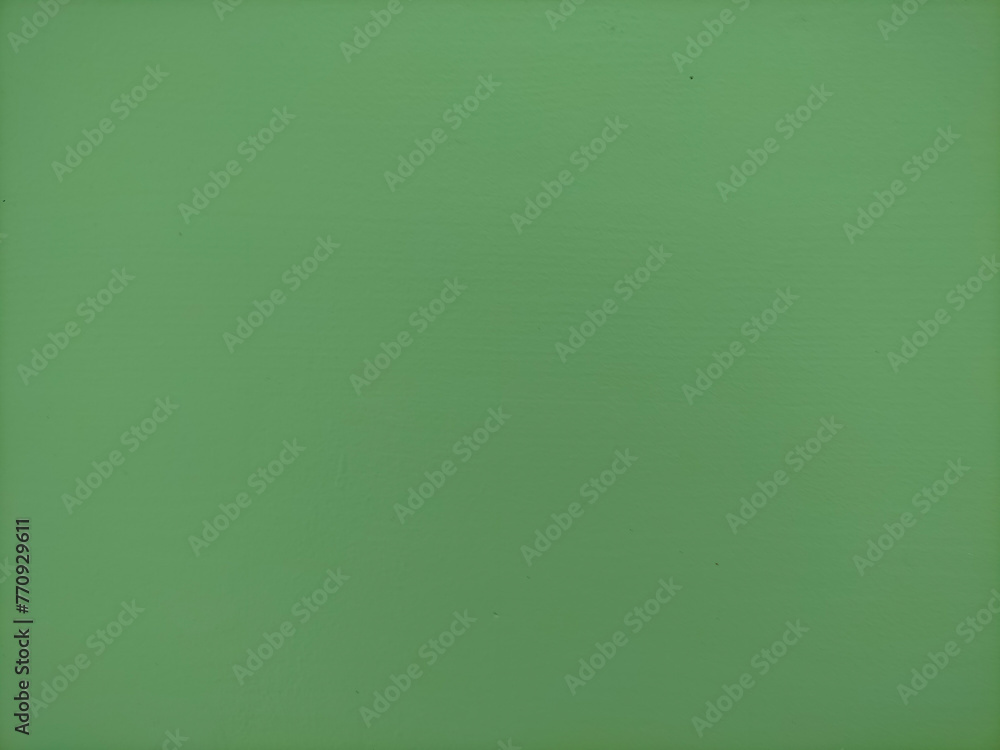soft green background on a cement surface soft green background on a cement surface