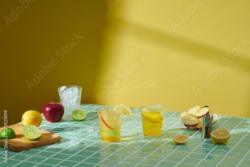 Set of glasses with different refreshing drinks on table