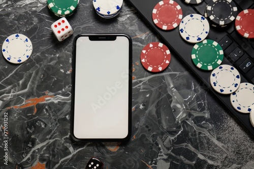 Phone with white mockup screen near chip cards and roulette with dice, online casino photo