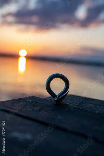 dock ring at sunset, dusk at the lake 