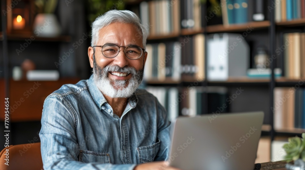 Man Working on Laptop Computer