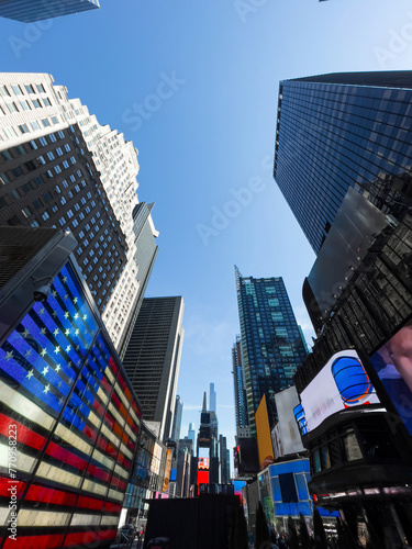 Times Square skyscrapers with digital American flag photo