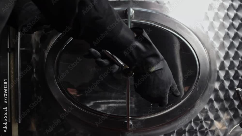 Turning and opening sealed valve wine tank Turning and opening sealed valve wine tank