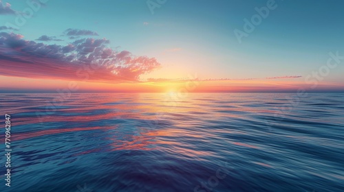 The ocean is calm and the sky is a beautiful orange color. The sun is setting, casting a warm glow over the water