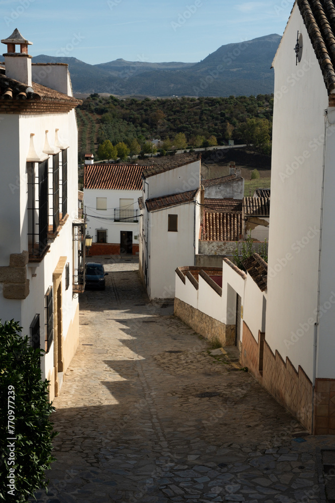 An urban landscape showing a traditional street in Andalusia, Spain An urban landscape showing a traditional street in Andalusia, Spain