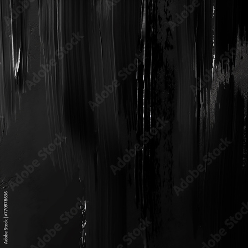 Strokes of black paint on a wall or other surface. A uniform black background with strokes of paint applied with a brush, creativity. Dark background