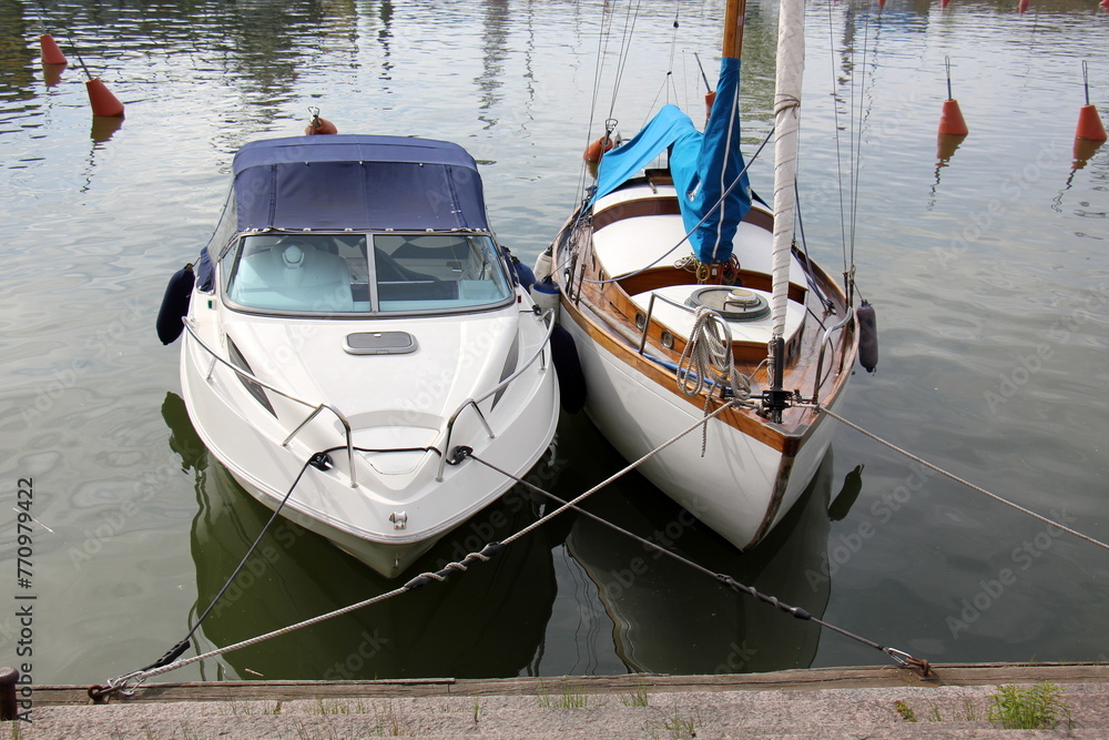A pier on the shore for mooring boats and yachts. A pier on the shore for mooring boats and yachts.