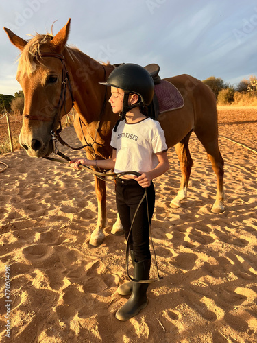 young rider with horse  photo