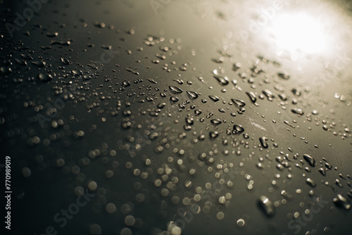 Drops of water on metal surface photo