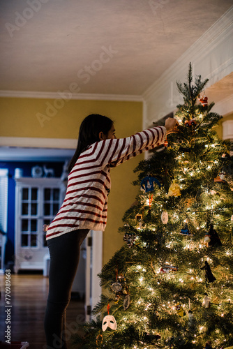 girl with Christmas tree