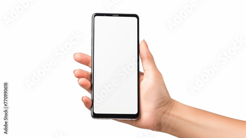 Hand holding smartphone on white background. White screen. photo