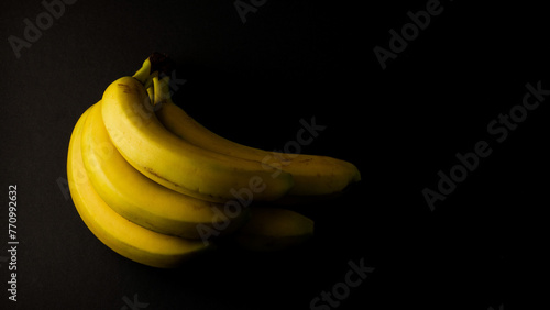banana on black background illustration national banana day
