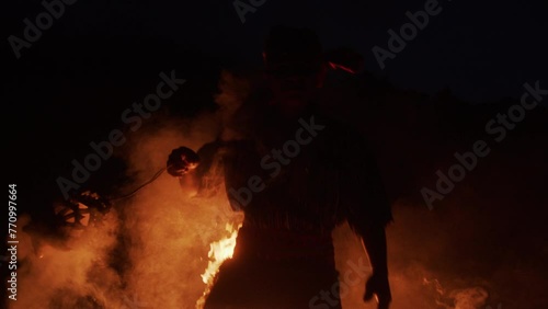 Indigenous Shaman Dancing around the Bonfire