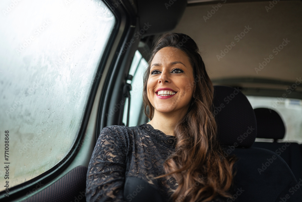 portrait of elegant young woman traveling by car on a rainy day portrait of elegant young woman traveling by car on a rainy day