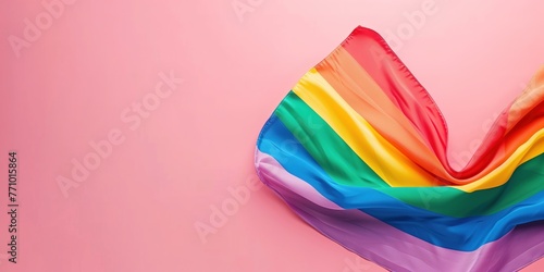 LGTBIQ Colorful Rainbow Waving Flag On Pink Background With Copy Space