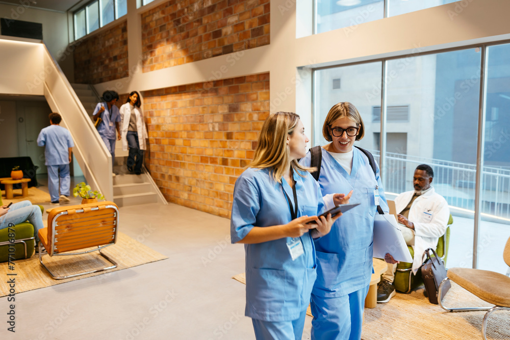 Medical workers in hospital hall Medical workers in hospital hall