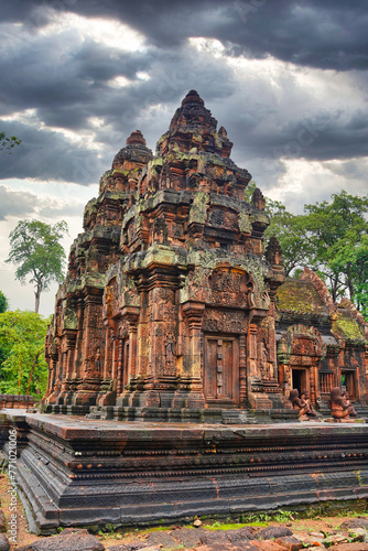 Banteay Srei - 10th century Hindu temple and masterpiece of old Khmer architecture built by Yajnavaraha in red sandstone at Siem Reap, Cambodia, Asia photo