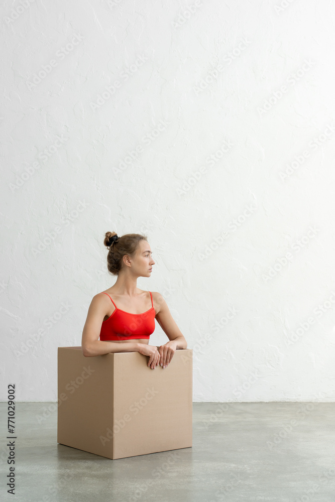 Performance of athletic woman in bright red tights with craft bo Performance of athletic woman in bright red tights with craft bo