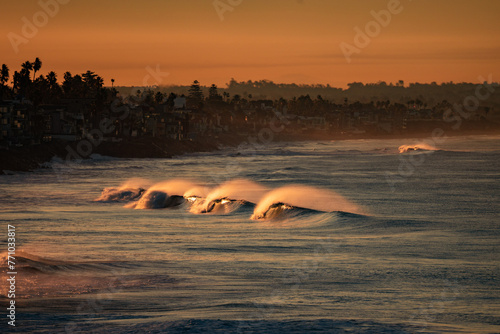 crashing waves at sunrise © derek