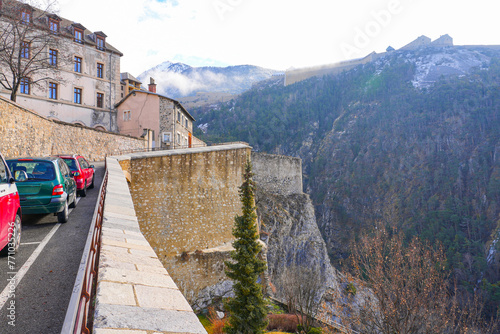 Fortified wall of the city of Briançon built by Vauban in the French Alps - Citadel on top of a rocky spur in a mountainous valley in France photo