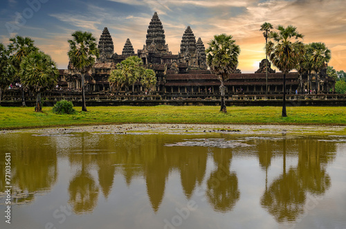 Angkor Wat Temple Complex reflected in the lake at Sunrise - UNESCO World Heritage 12th century masterpiece of Khmer Architecture built by Suryavarman II at Siem Reap  Cambodia  Asia