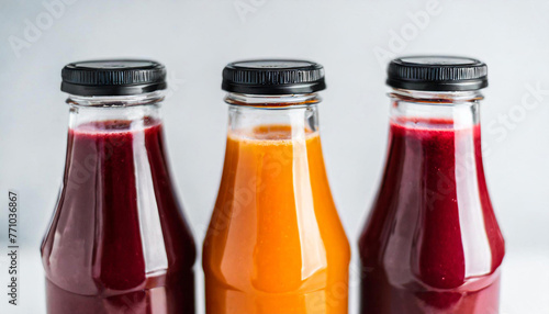 freshly squeezed fresh fruit juices in glass bottles with closed lids