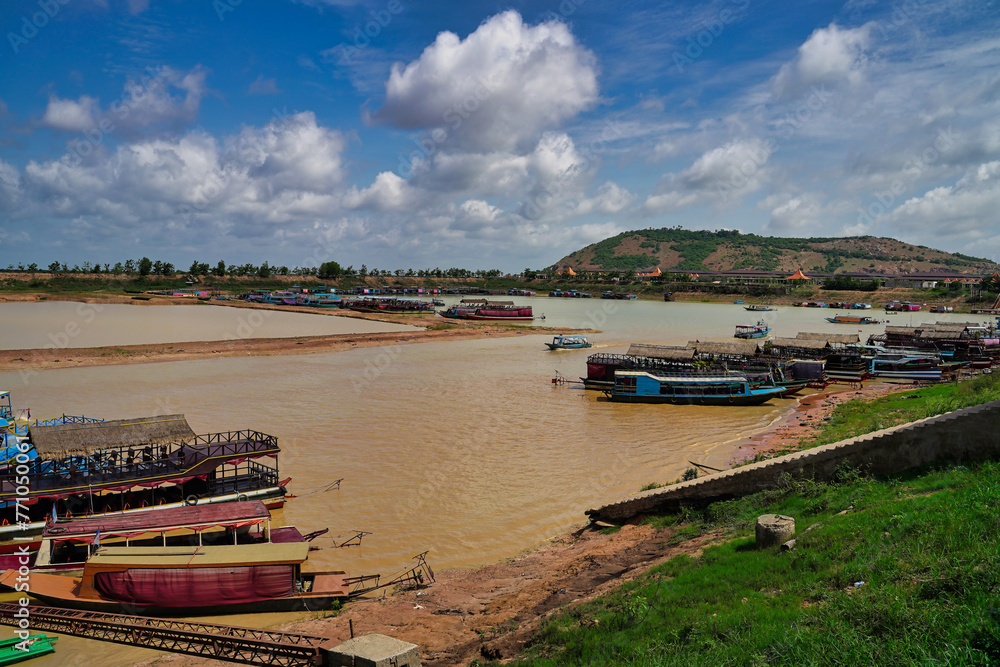 Fototapeta premium River boats carrying goods to Tonle Sap lake at Siem Reap, Cambodia, Asia