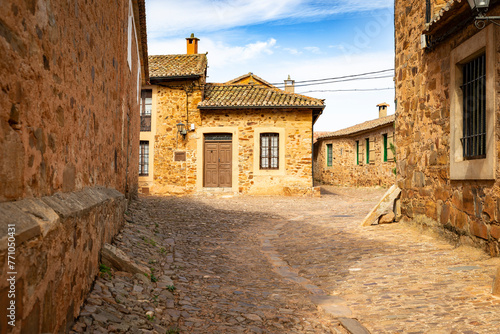 street with traditional architecture in Castrillo de los Polvazares, municipality of Astorga, comarca of Maragateria, province of Leon, Castile and Leon, Spain photo