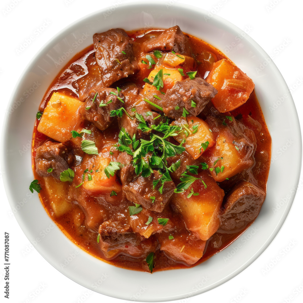 Savory beef goulash with vegetables in a dark bowl cut out on transparent background Savory beef goulash with vegetables in a dark bowl cut out on transparent background