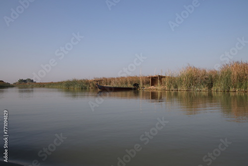 canoe in the Chibayish marshes in Iraq , Marshes of the arabs and iraq 