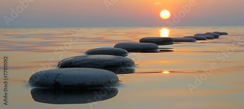 Zen stones reflecting tranquil sunset s glow in serene waters create a peaceful ambiance