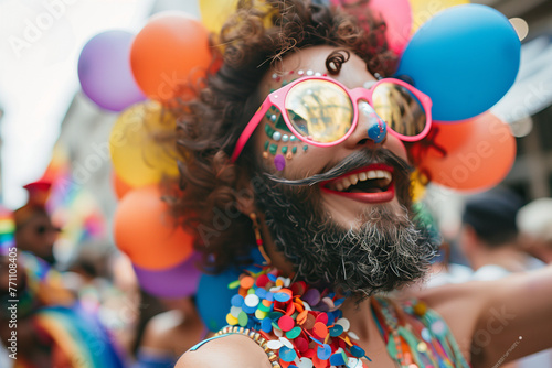 Drag King on gay pride day, woman with false beard and moustache celebrating with joy on the streets of lgbt party photo