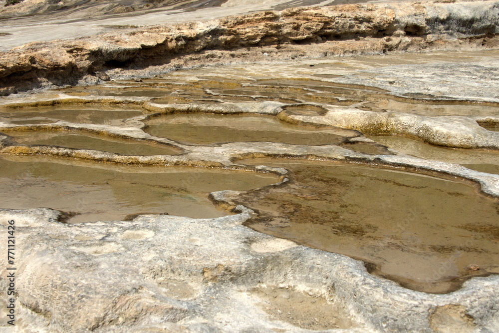 Shallow pools in the tavertine rock at Hierve el Agua in Oaxaca, Mexico - obrazy, fototapety, plakaty 