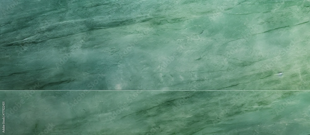 A detailed shot capturing the intricate pattern of green marble texture, resembling electric blue tints and shades. The flooring material mimics the beauty of natural grass and water
