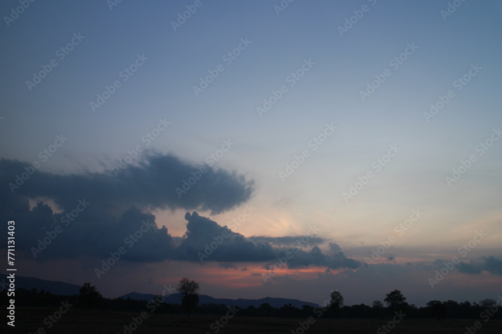 Colorful cloudy sky at sunset. Gradient color. Sky texture, abstract nature background