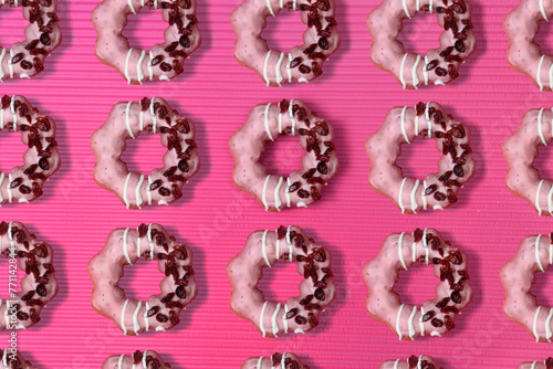 Pattern of doughnut in pink and graphic style background
