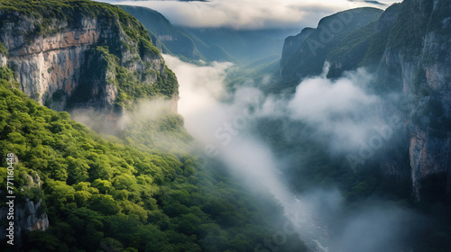 view of the mountains covered in clouds.