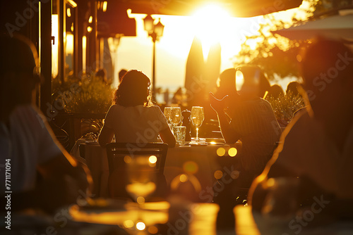 people are dining at a restaurant at sunset in the st d71b8ddd-5581-4b4d-92c9-5bcfefe29e7e 0 photo