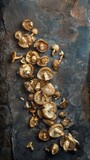 Mushrooms scattered artistically on a dark slate