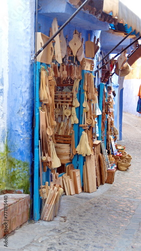 Shop with carved wood items on display in Chefchaouen, Morocco © Angela