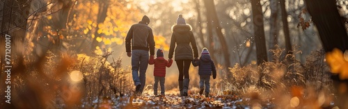 Smiling Family of Four Poses Together in Outdoor Portrait