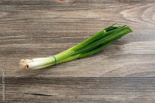 A view of a bundle of scallions.
