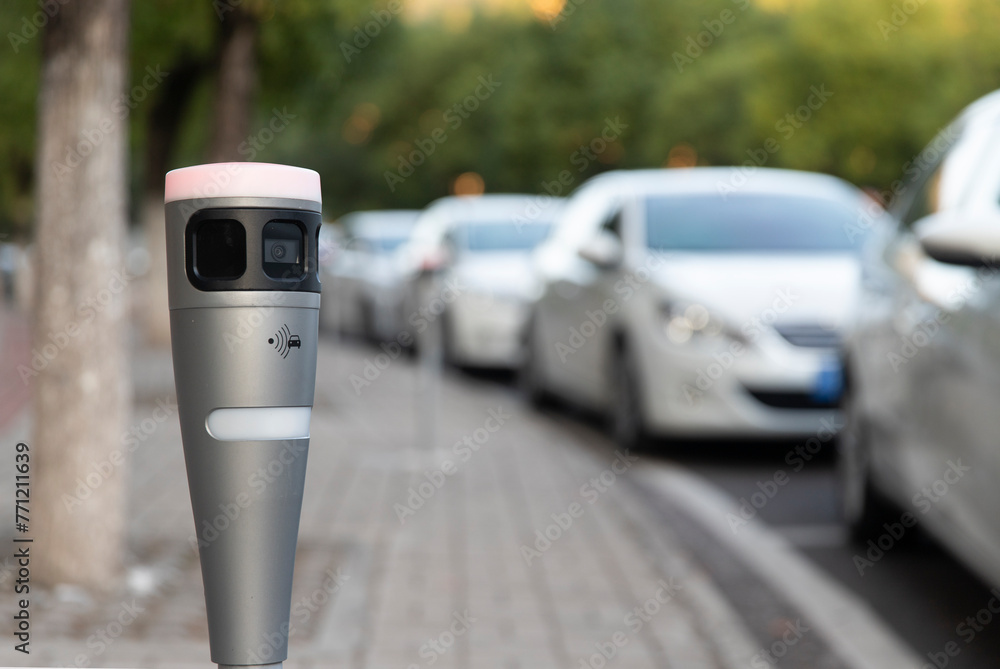 Modern intelligent parking timing and toll collection equipment, with cars parked on the roadside automatically sensing timing and toll collection Modern intelligent parking timing and toll collection equipment, with cars parked on the roadside automatically sensing timing and toll collection
