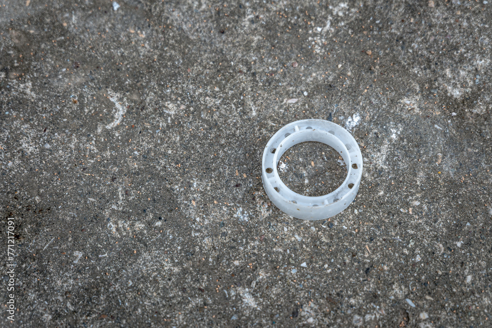 Discarded Plastic Lid on Urban Ground Discarded Plastic Lid on Urban Ground