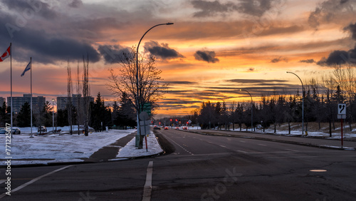 Sunset landscape in city of Edmonton with red traffic lights