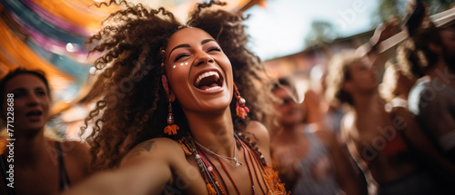 Joyous soul in the morning crowd. A vibrant young woman laughs and dances joyfully in the midst of a lively crowd at a rock or electronic music festival in the early morning