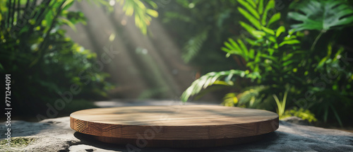 Round wooden podium or pedestal with blurred tropical leaves background for product presentation 3D rendering