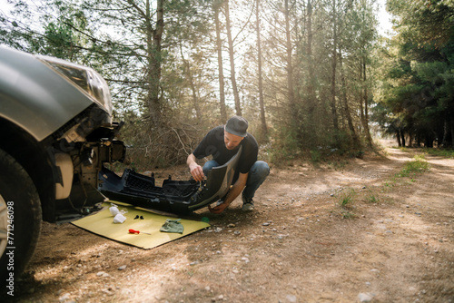car repair in the forest