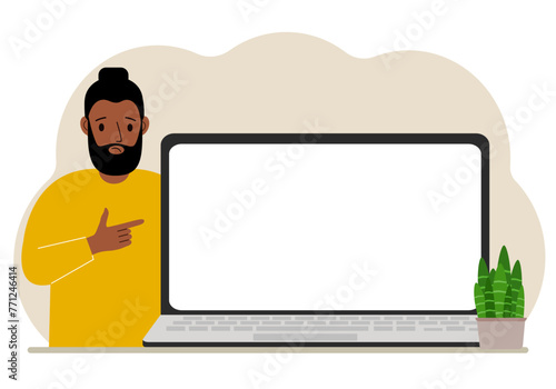 A man next to a large laptop with plenty of space for text. Vector flat illustration