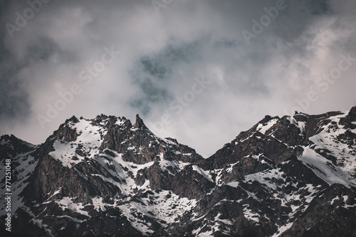 Scenic view of snow-covered mountains in Himachal Pradesh.